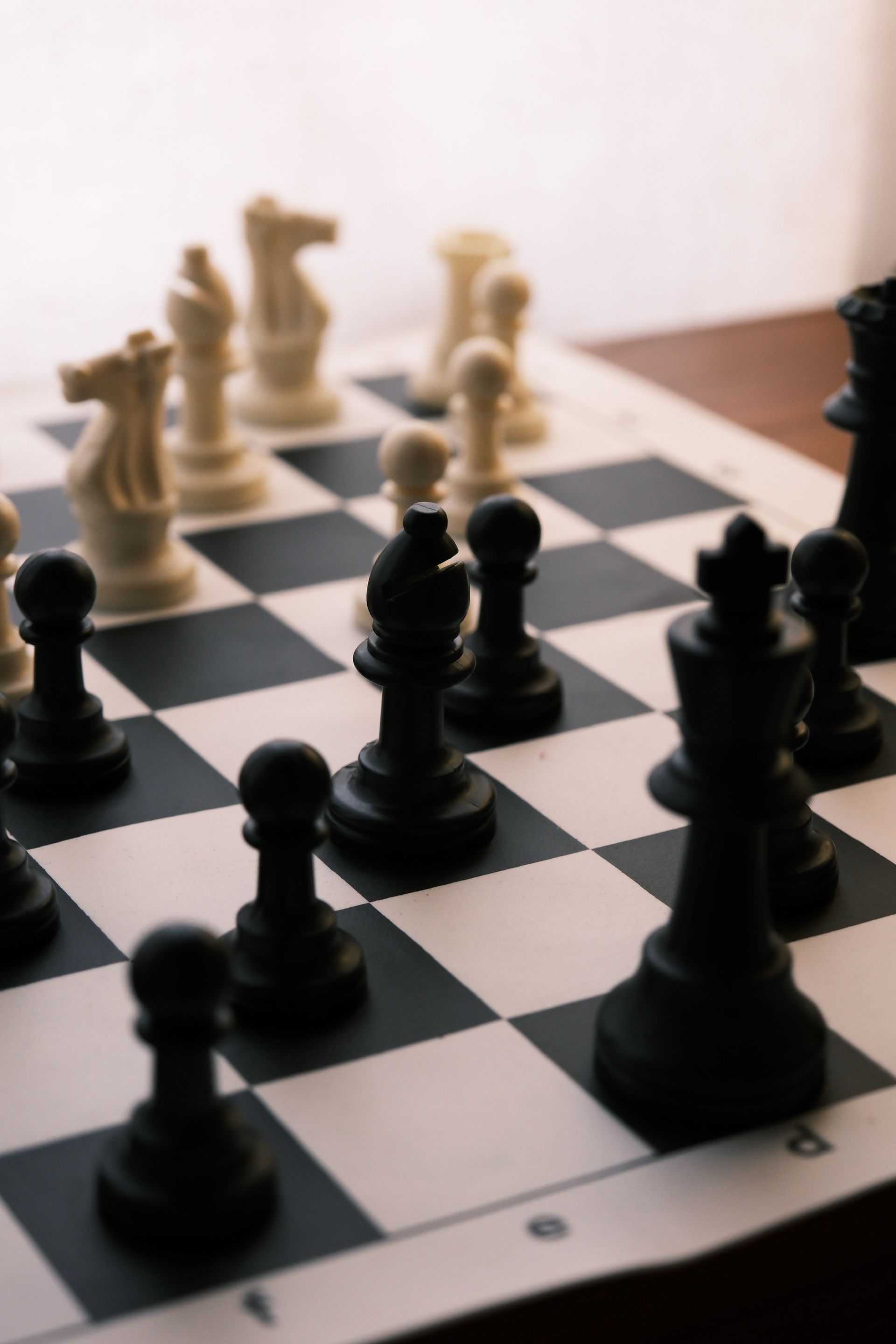 Classic chess set on wooden board